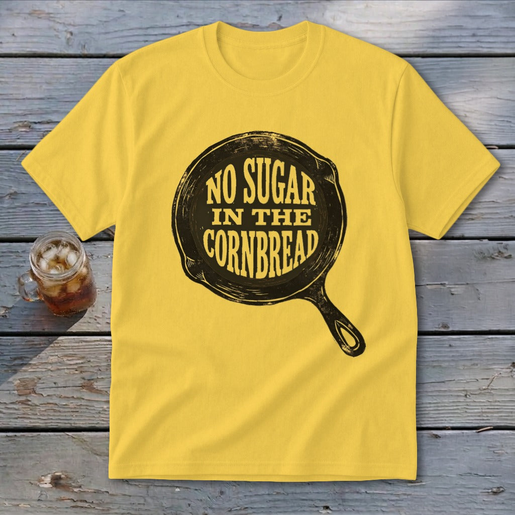 Yellow t-shirt with "No Sugar in the Cornbread" text inside a cast iron skillet.