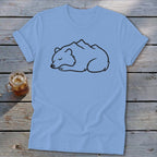 Light blue t-shirt with black outline of a sleeping bear with mountains on its back.