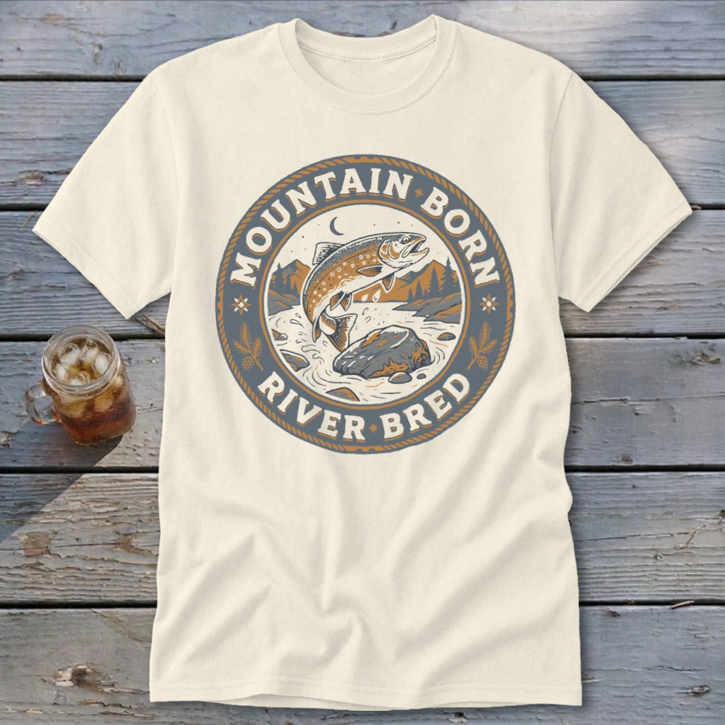 Cream t-shirt with "Mountain Born River Bred" circular graphic of jumping trout.