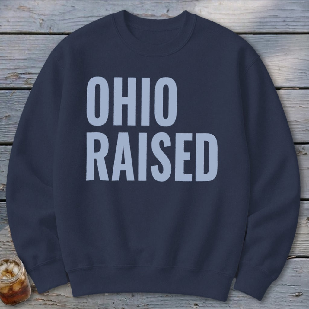 Navy sweatshirt with light blue "OHIO RAISED" text