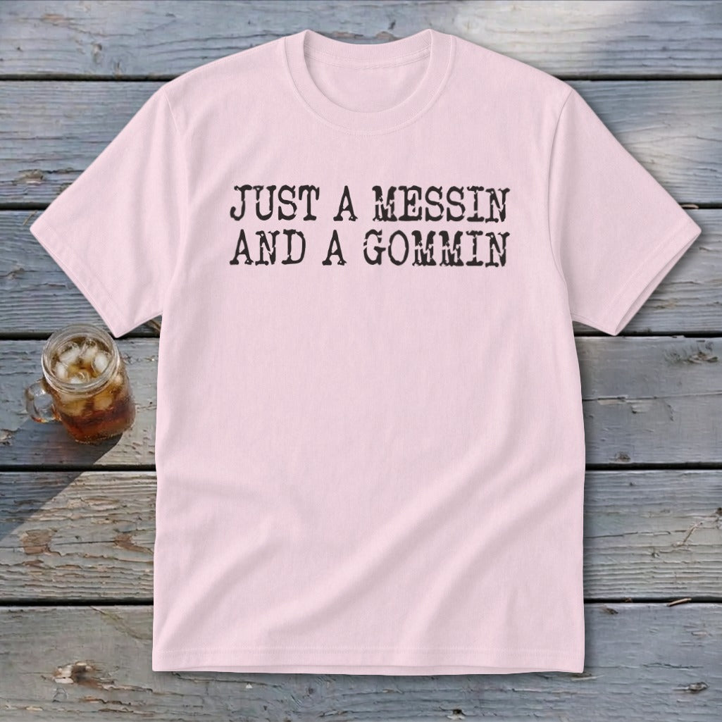 Pink t-shirt with black text "JUST A MESSIN AND A GOMMIN".