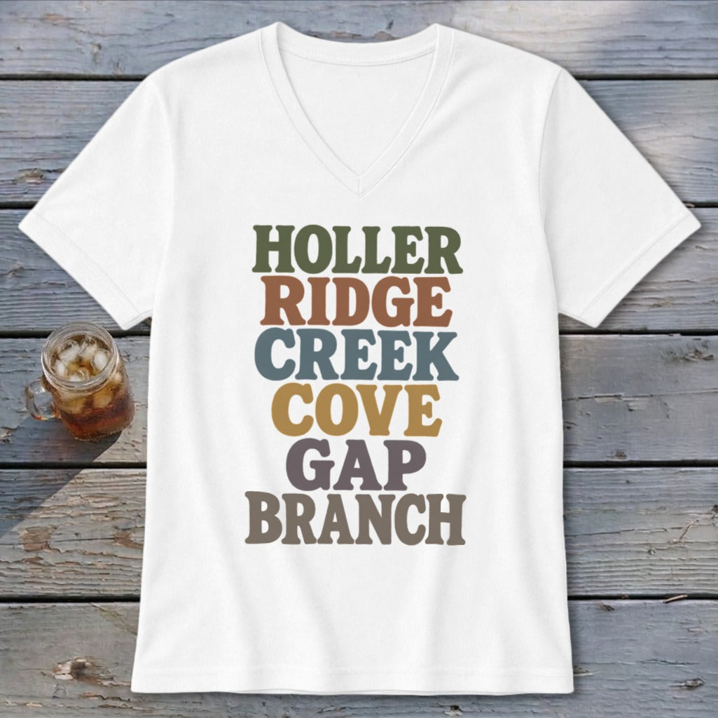 A white V-neck t-shirt with multi-colored stacked text reading HOLLER RIDGE CREEK COVE GAP BRANCH.