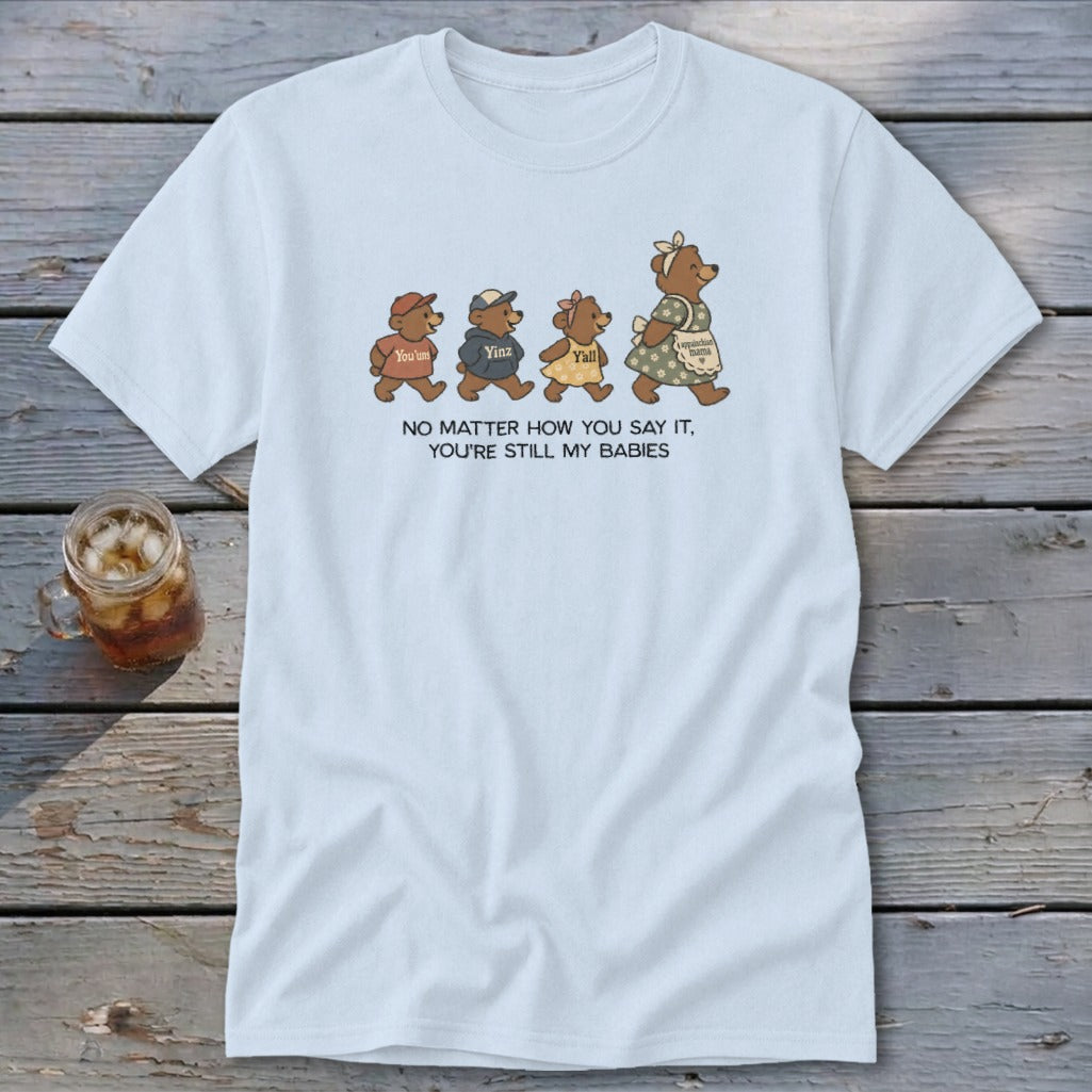 Light blue t-shirt with mama bear and cubs graphic, text reads "NO MATTER HOW YOU SAY IT, YOU'RE STILL MY BABIES".