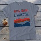 Stars, Stripes & Sweet Tea graphic on a slate blue t-shirt.