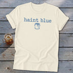 Cream t-shirt with "haint blue" text and a paint can graphic.