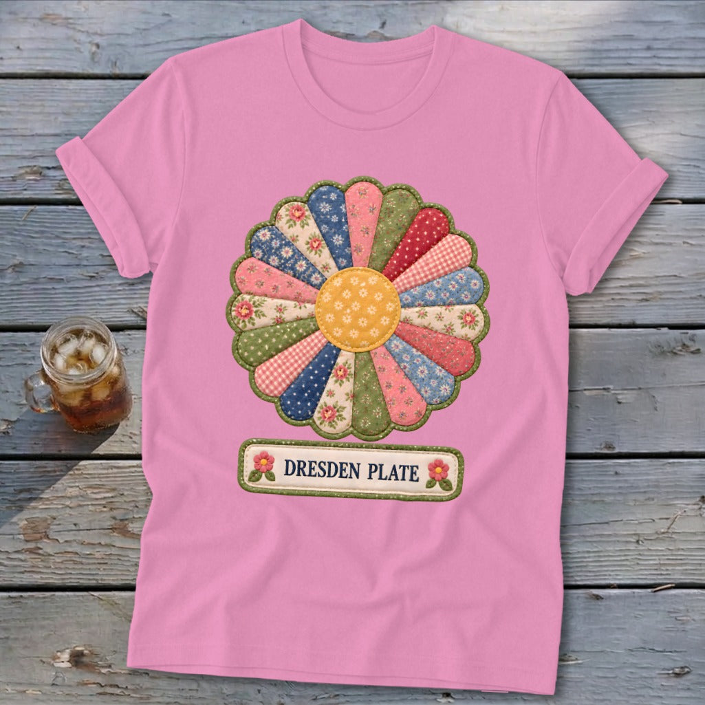 Pink t-shirt with a colorful Dresden Plate fabric flower design and "DRESDEN PLATE" label.