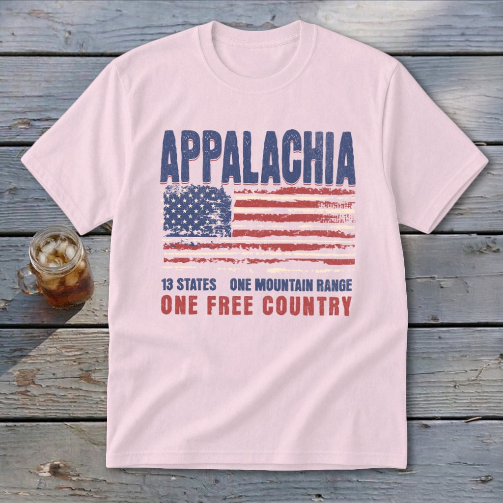 Light pink t-shirt featuring a distressed American flag graphic and the text Appalachia, 13 States, One Mountain Range, One Free Country.