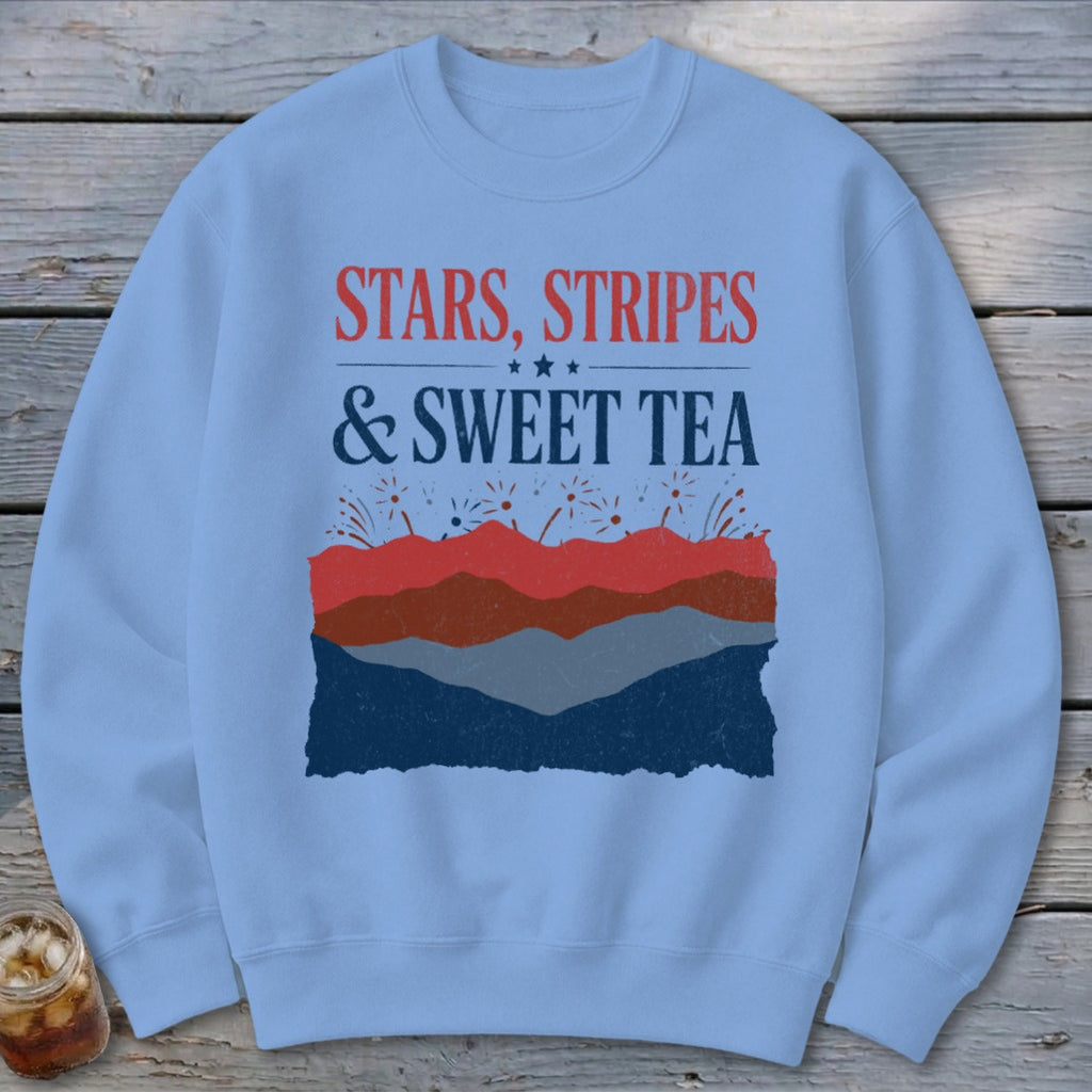 Light blue crewneck sweatshirt featuring the red, white, and blue graphic text Stars, Stripes, and Sweet Tea.