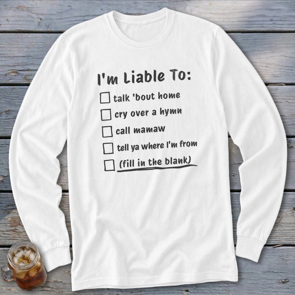 White long sleeve shirt with black text listing things "I'm Liable To:".