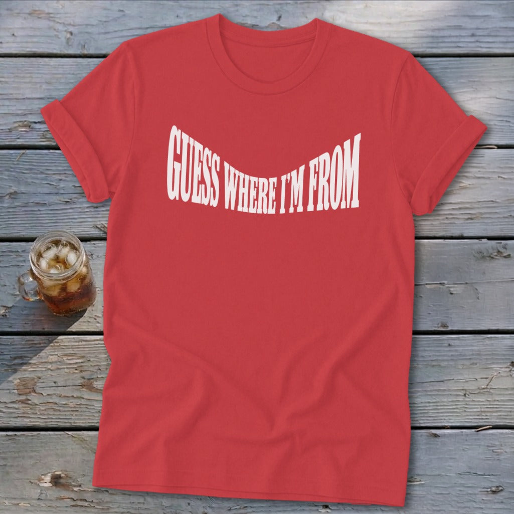 Red t-shirt with white text that reads "GUESS WHERE I'M FROM".