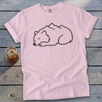 Pink t-shirt with sleeping bear and mountain graphic.