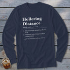 Navy long-sleeve shirt with "Hollering Distance" definition in white text.