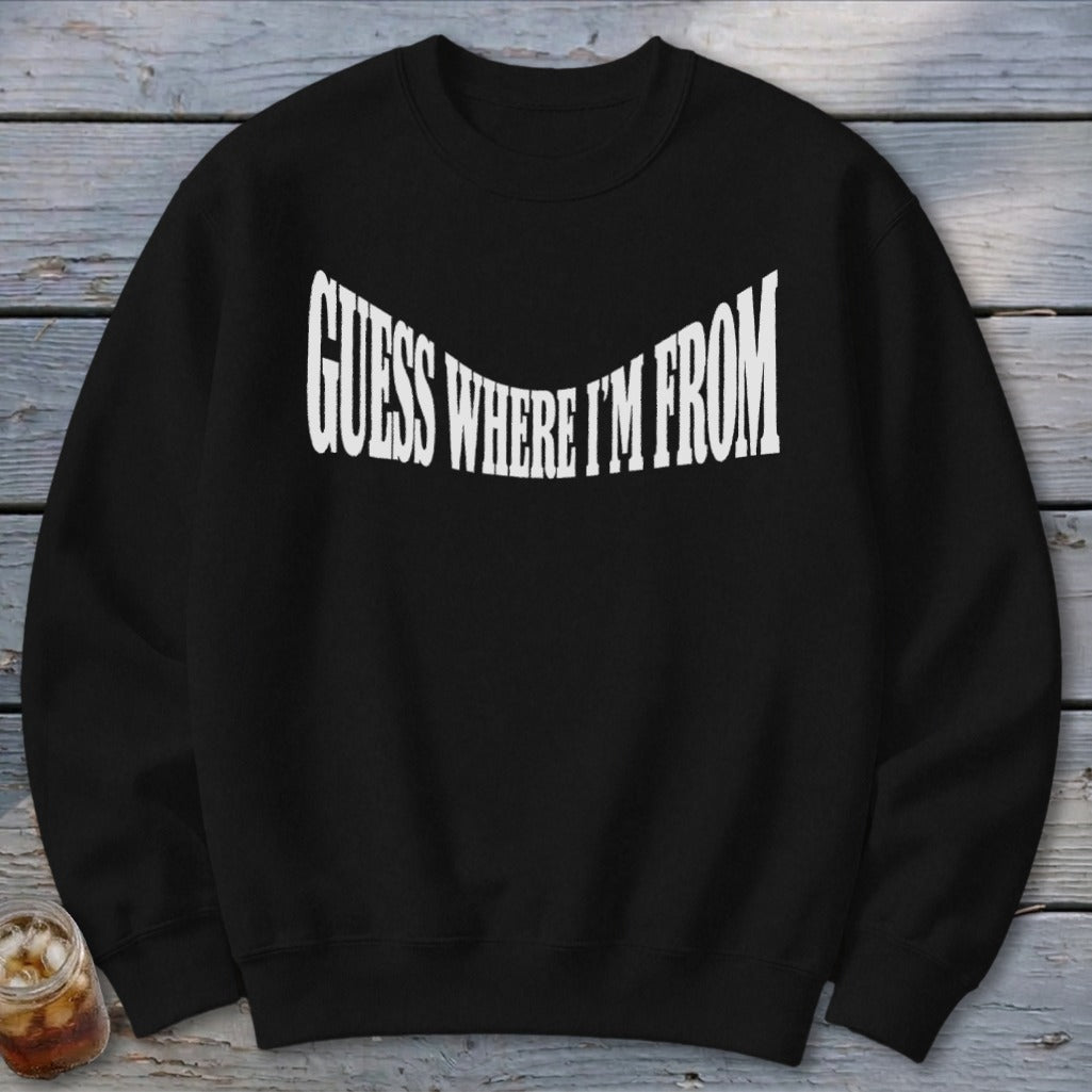 Black crewneck sweatshirt with white text "GUESS WHERE I'M FROM" curved across the chest.