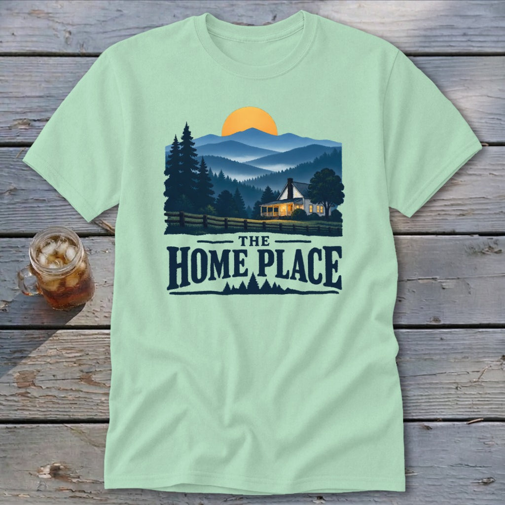 Light green t-shirt with a landscape scene and the text "The Home Place".