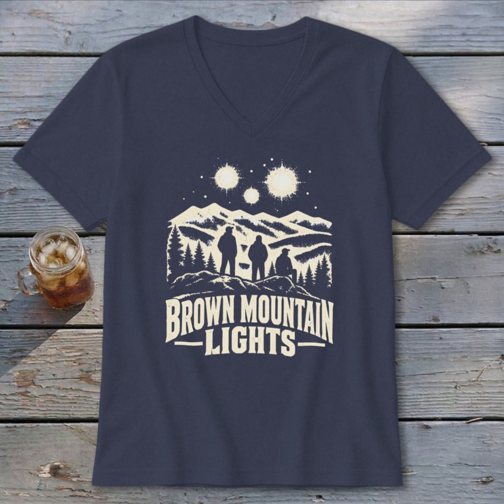 Dark blue V-neck t-shirt featuring a graphic of three figures looking at mountain lights.