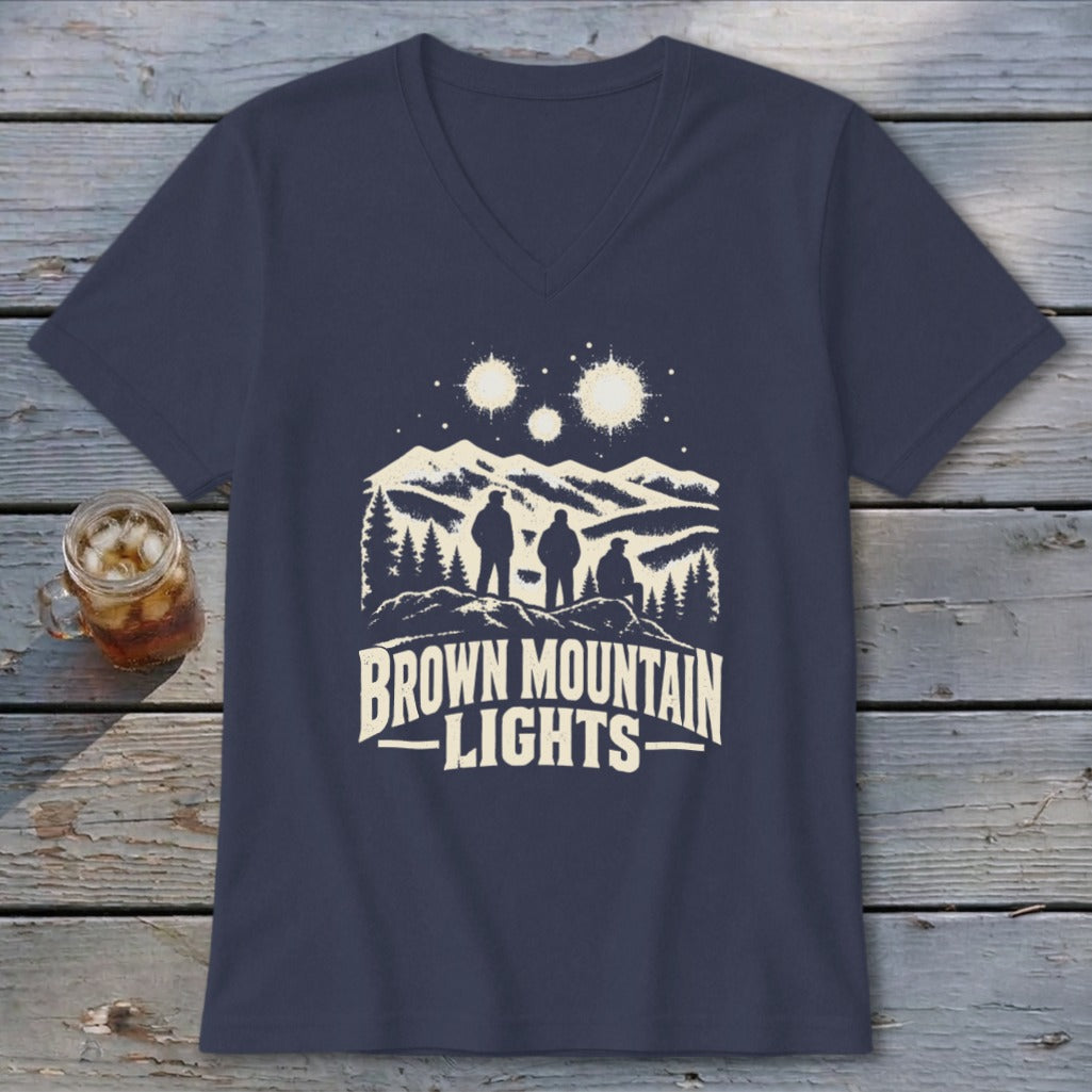 Dark blue V-neck t-shirt featuring a graphic of three figures looking at mountain lights.