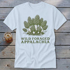 White t-shirt with green morel mushrooms and text "Wild Foraged Appalachia".