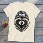 Graphic tee with a black and white illustration of a raccoon wearing a beanie with a mountain patch.