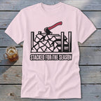Pink t-shirt with woodpile graphic and text "STACKED FOR THE SEASON"