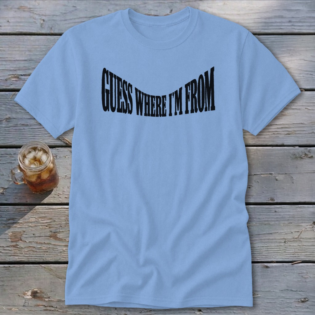 Light blue t-shirt with black text that reads "GUESS WHERE I'M FROM".