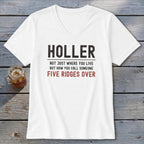 White v-neck t-shirt with text "HOLLER NOT JUST WHERE YOU LIVE BUT HOW YOU CALL SOMEONE FIVE RIDGES OVER".