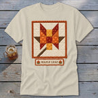 Cream t-shirt with a quilted maple leaf design and "MAPLE LEAF" text.