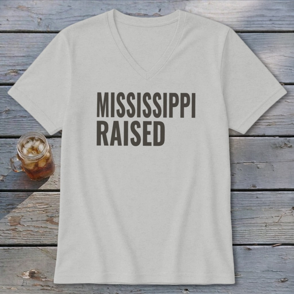 Light gray v-neck t-shirt with "MISSISSIPPI RAISED" text in dark gray.