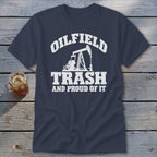 Dark blue t-shirt with white text and oil derrick graphic: "OILFIELD TRASH AND PROUD OF IT".