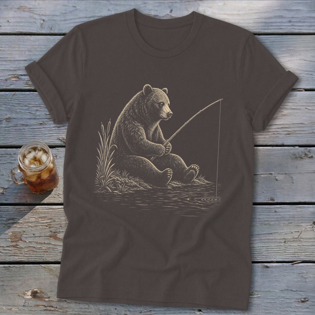 T-shirt with graphic of a bear fishing by the water.