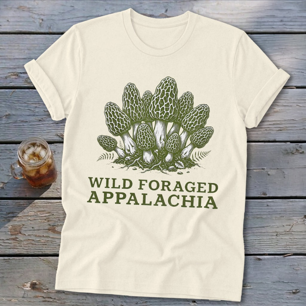 Cream t-shirt with green illustration of morel mushrooms and text "Wild Foraged Appalachia".