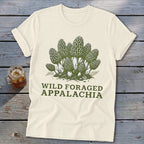 Cream t-shirt with green illustration of morel mushrooms and text "Wild Foraged Appalachia".