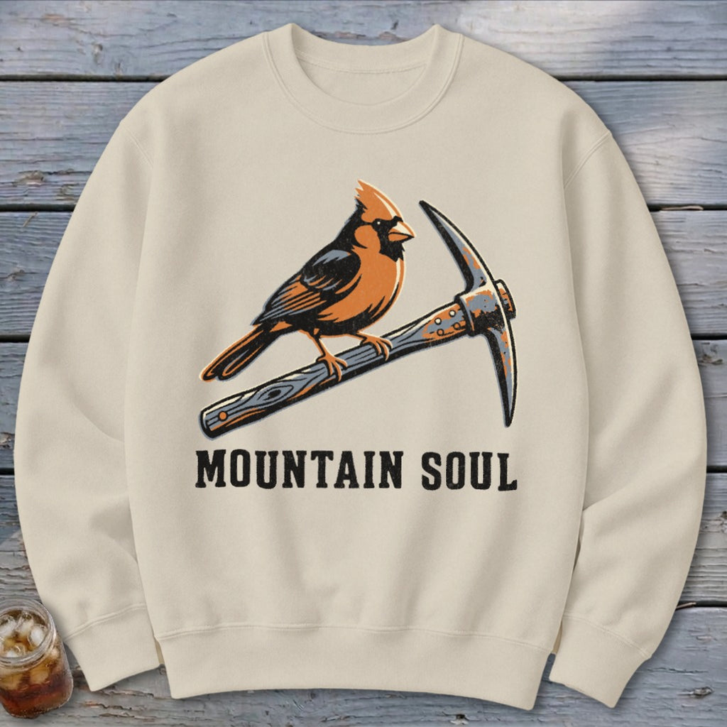Cream sweatshirt with cardinal on pickaxe and "MOUNTAIN SOUL" text.