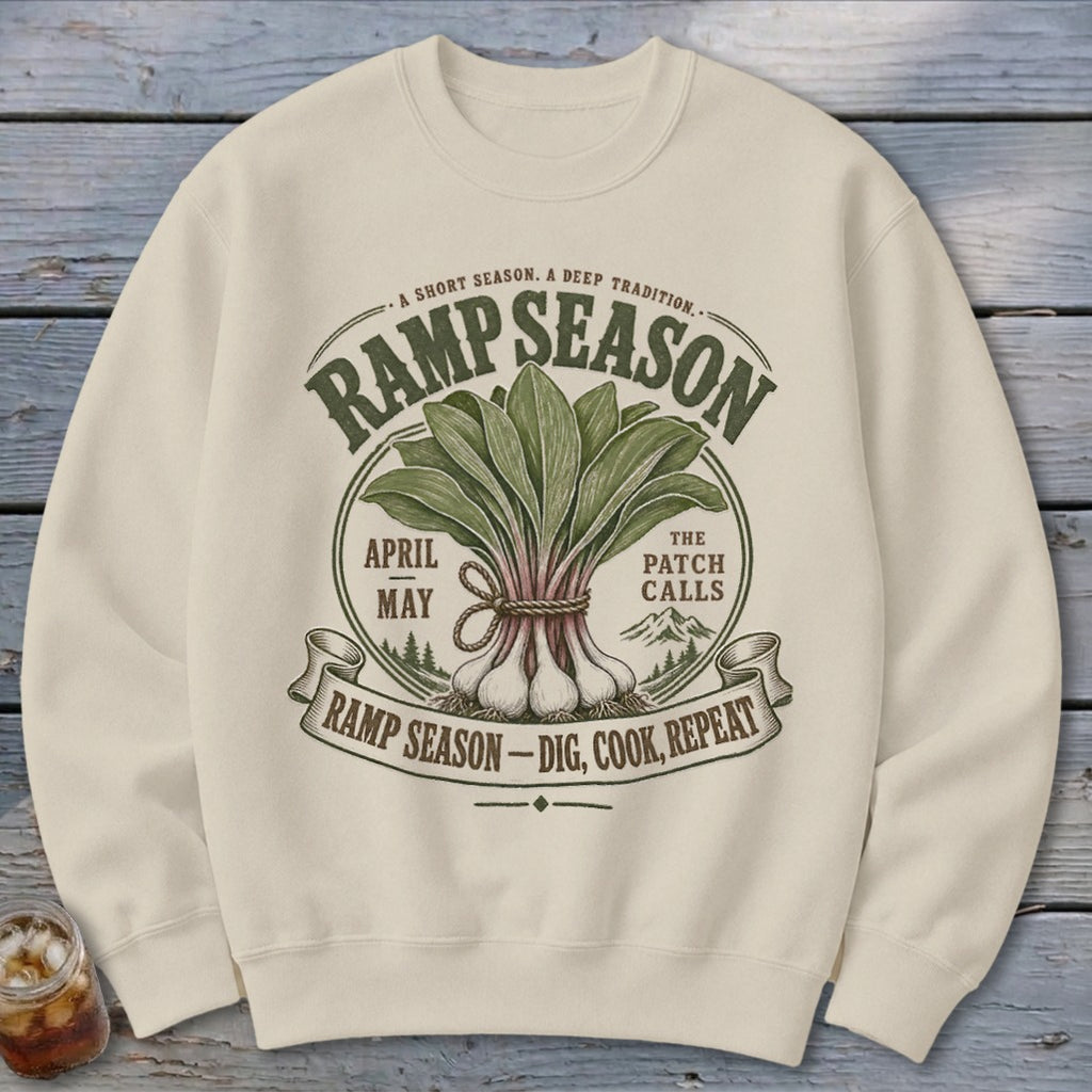 Cream sweatshirt with RAMP SEASON graphic featuring ramps, mountains, and text.