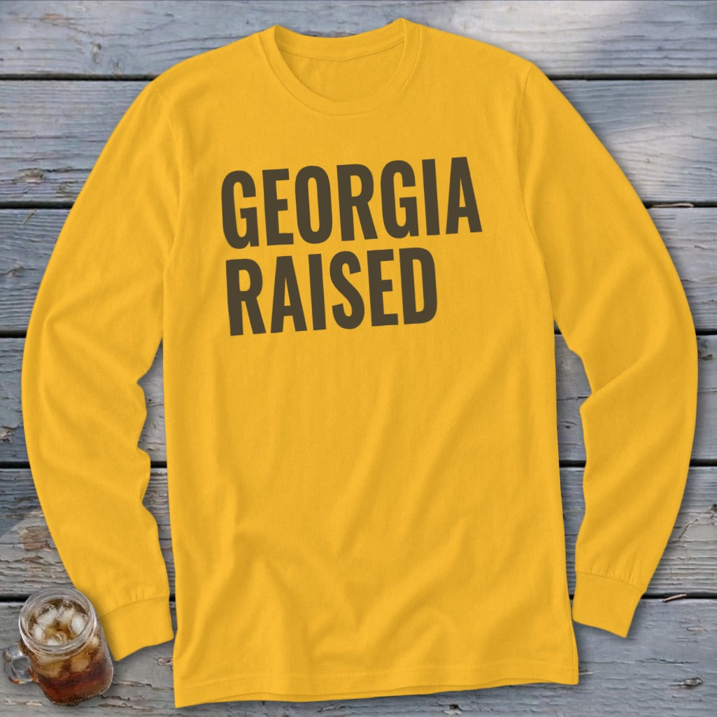 Yellow long sleeve shirt with "GEORGIA RAISED" text in dark gray.