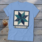 Light blue t-shirt featuring an eight-pointed star quilt block design with text.