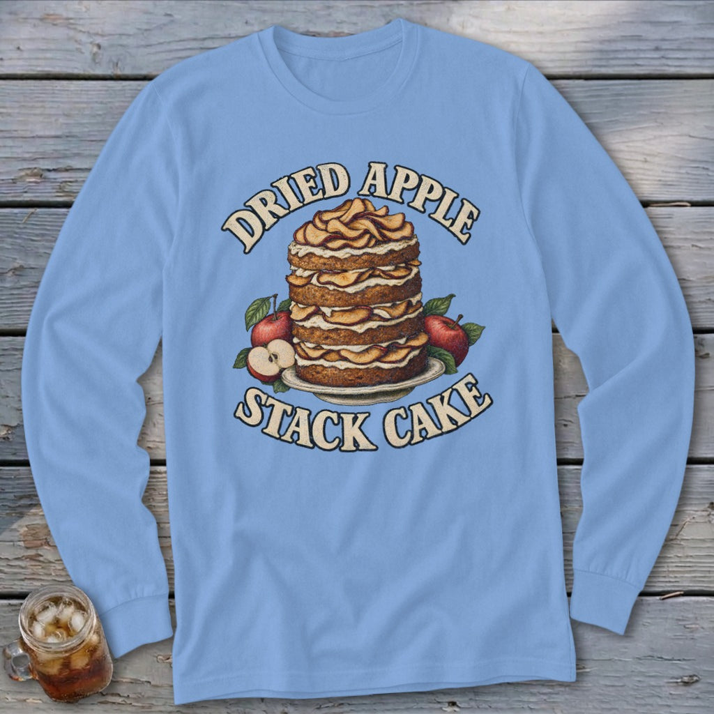 Dried Apple Stack Cake graphic with apples on a light blue long-sleeve shirt.