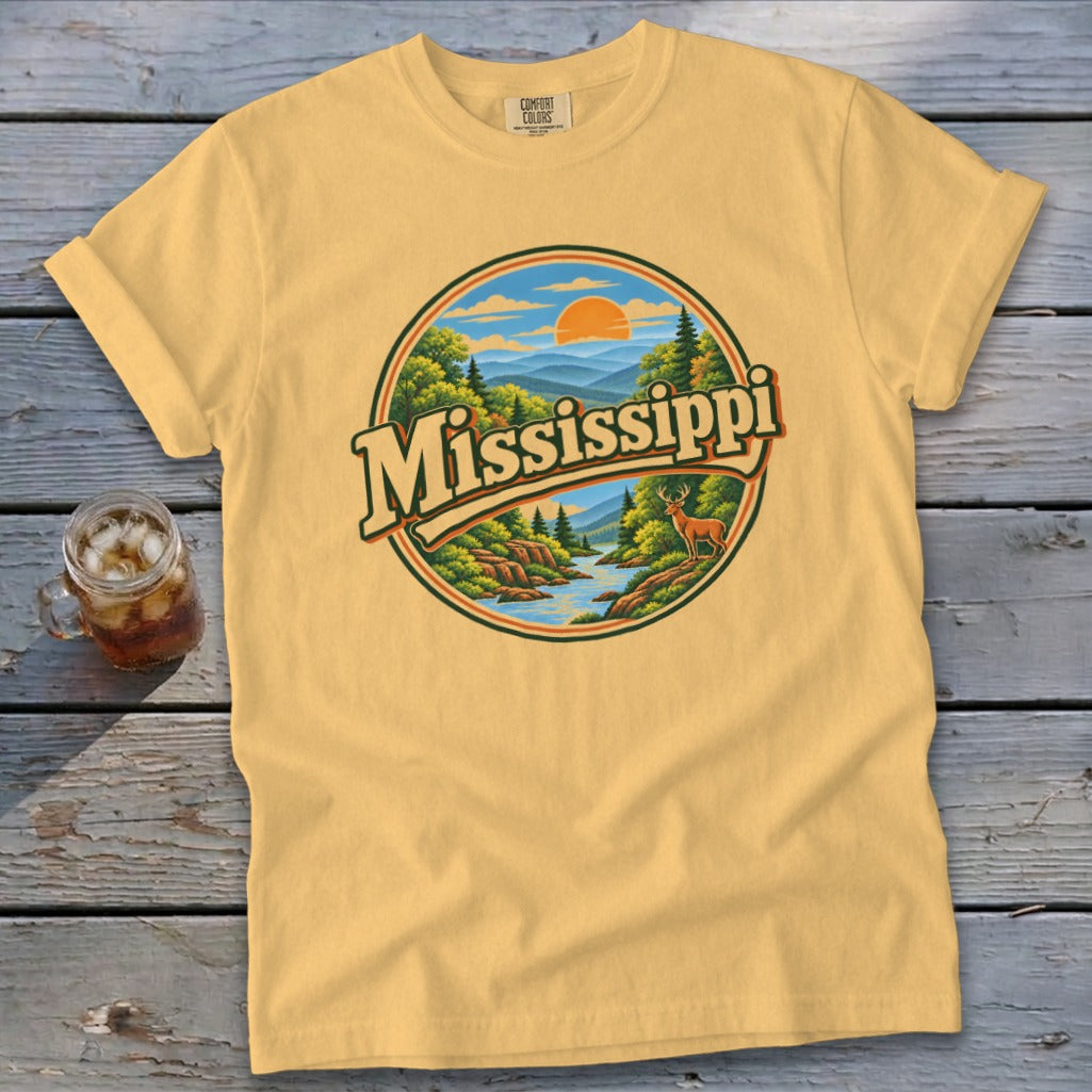 Yellow t-shirt with circular graphic featuring "Mississippi" text, river, deer, and mountains.