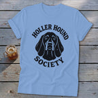 Light blue t-shirt with black "Holler Hound Society" text and dog graphic.