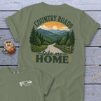 Olive green t-shirt with "COUNTRY ROADS take me HOME" text and mountain landscape graphic.