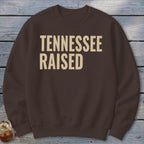 Brown sweatshirt with "TENNESSEE RAISED" text in beige.