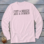 Light pink long-sleeved shirt with black text reading "JUST A MESSIN AND A GOMMIN".