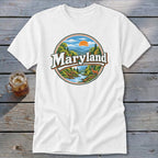 White t-shirt with circular Maryland graphic of mountains, river, trees, deer, and sun