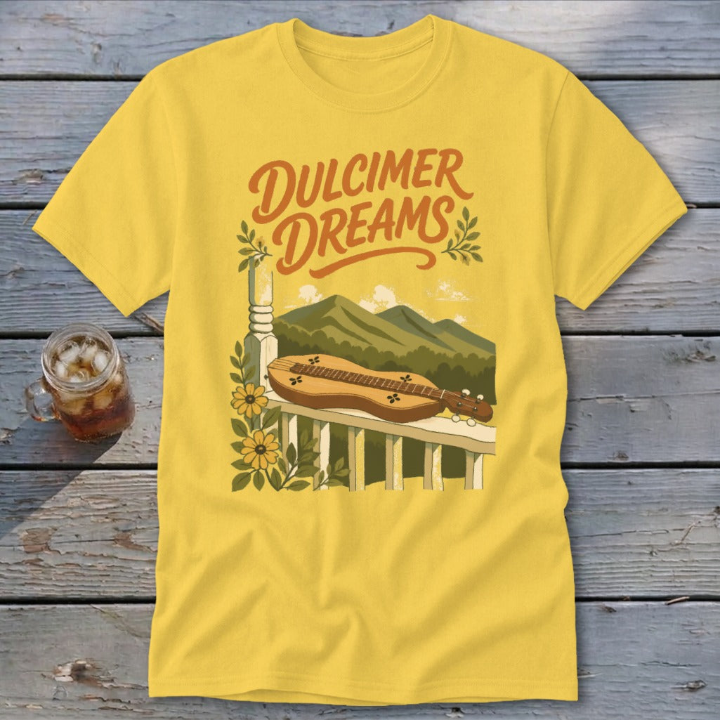 Yellow t-shirt with "Dulcimer Dreams" text and a dulcimer on a porch.