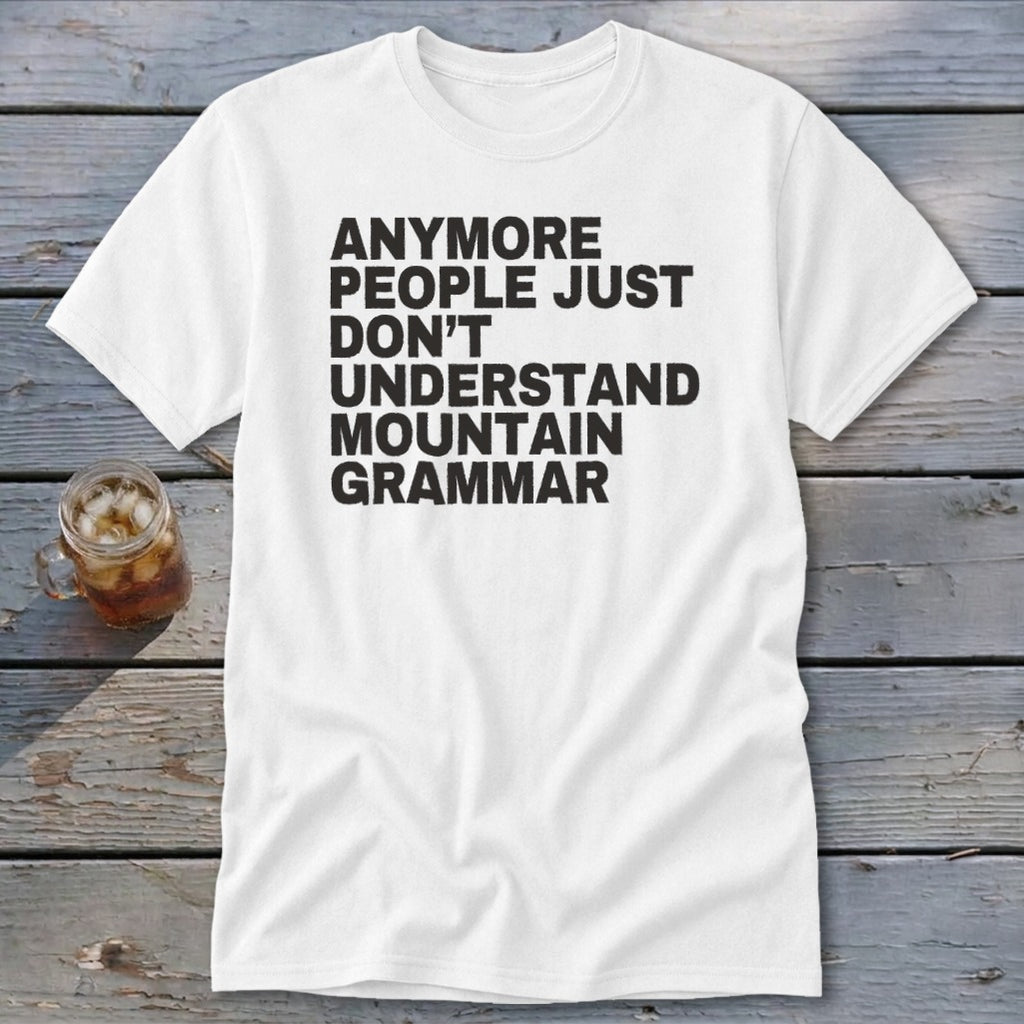 White t-shirt with black text that reads "anymore people just don't understand mountain grammar".