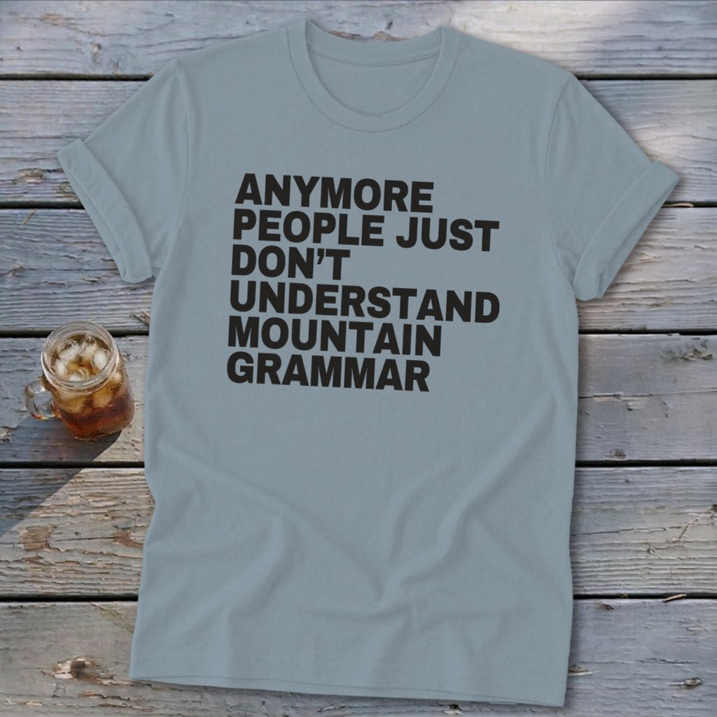 Light blue t-shirt with black text reading "ANYMORE PEOPLE JUST DON'T UNDERSTAND MOUNTAIN GRAMMAR".