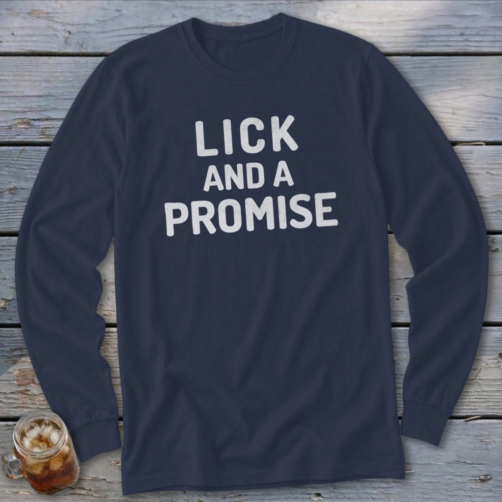 Navy long-sleeve shirt with white text "LICK AND A PROMISE"
