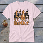 Pink t-shirt with four howling hounds and the word "holler" below.