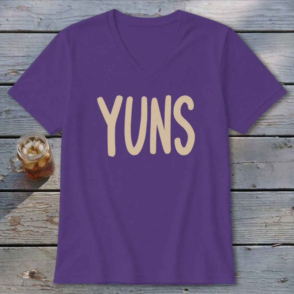 Purple v-neck t-shirt with tan text "YUNS" on the front.