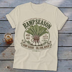 Cream t-shirt with "Ramp Season" graphic featuring ramps, April, May, and mountains.