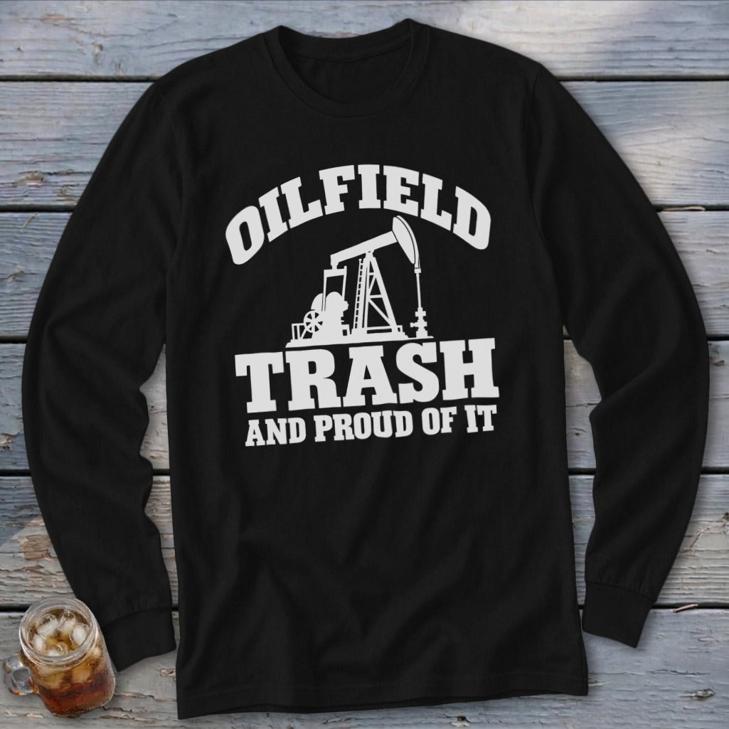 Black long sleeve shirt with white text and oil rig graphic saying "Oilfield Trash and Proud of It".